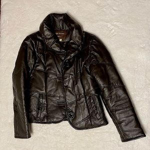 Brown leather coat. Middle button missing.